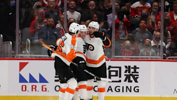 WASHINGTON, DC - OCTOBER 08: Cam Atkinson #89 of the Philadelphia Flyers celebrates scoring a second period goal with Joel Farabee #86 and Derick Brassard #19 against the Washington Capitals during a preseason game at Capital One Arena on October 08, 2021 in Washington, DC. (Photo by Rob Carr/Getty Images)