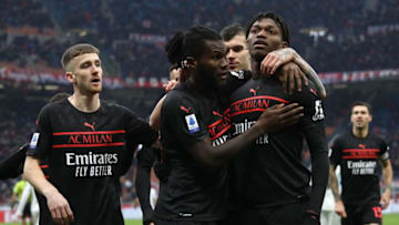 MILAN, ITALY - DECEMBER 04: Franck Kessie (C) of AC Milan celebrates with his team-mates Rafael Leao (R) and Alexis Saelemaekers (L) after scoring the opening goal during the Serie A match between AC Milan v US Salernitana at Stadio Giuseppe Meazza on December 04, 2021 in Milan, Italy. (Photo by Marco Luzzani/Getty Images)