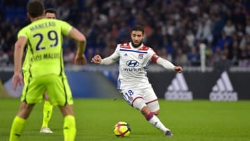 Lyon's French forward Nabil Fekir (R) runs with the ball during the French L1 football match between Lyon (OL) and Angers (SCO) on April 19, 2019, at the Groupama Stadium in Decines-Charpieu, near Lyon, central-eastern France. (Photo by ROMAIN LAFABREGUE / AFP) (Photo credit should read ROMAIN LAFABREGUE/AFP/Getty Images)