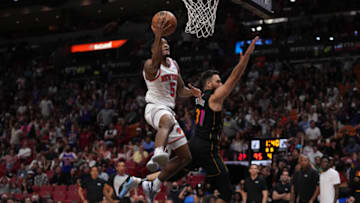 Knicks guard Immanuel Quickley (5) puts up a shot over Miami Heat guard Max Strus (31)(Jasen Vinlove-USA TODAY Sports)