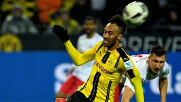 Dortmund's Gabonese forward Pierre-Emerick Aubameyang (L) and Leipzig's Leipzig's defender Willi Orban (R) vie for the ball during the German First division Bundesliga football match between Borussia Dortmund and RB Leipzig, in Dortmund, western Germany, on February 4, 2017. / AFP / SASCHA SCHUERMANN / RESTRICTIONS: DURING MATCH TIME: DFL RULES TO LIMIT THE ONLINE USAGE TO 15 PICTURES PER MATCH AND FORBID IMAGE SEQUENCES TO SIMULATE VIDEO. == RESTRICTED TO EDITORIAL USE == FOR FURTHER QUERIES PLEASE CONTACT DFL DIRECTLY AT 49 69 650050 (Photo credit should read SASCHA SCHUERMANN/AFP/Getty Images)