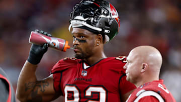 TAMPA, FLORIDA - OCTOBER 27: William Gholston #92 of the Tampa Bay Buccaneers drinks from a Gatorade bottle against the Baltimore Ravens during the second quarter at Raymond James Stadium on October 27, 2022 in Tampa, Florida. (Photo by Douglas P. DeFelice/Getty Images)