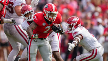Oct 2, 2021; Athens, Georgia, USA; Georgia Bulldogs running back Kendall Milton (2) runs against the Arkansas Razorbacks during the second half at Sanford Stadium. Mandatory Credit: Dale Zanine-USA TODAY Sports