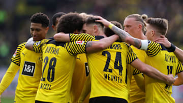 Borussia Dortmund players celebrate a goal. (Photo by Joosep Martinson/Getty Images)