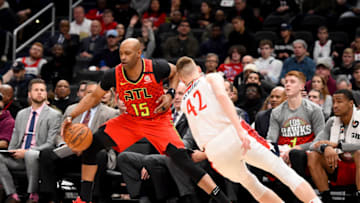 WASHINGTON, DC - MARCH 06: Vince Carter #15 of the Atlanta Hawks makes Davis Bertans #42 of the Washington Wizards fall during the first half at Capital One Arena on March 06, 2020 in Washington, DC. NOTE TO USER: User expressly acknowledges and agrees that, by downloading and or using this photograph, User is consenting to the terms and conditions of the Getty Images License Agreement. (Photo by Will Newton/Getty Images)