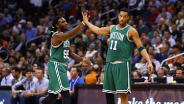 Feb 23, 2015; Phoenix, AZ, USA; Boston Celtics forward Jae Crowder (99) high fives guard Evan Turner (11) against the Phoenix Suns at US Airways Center. The Celtics defeats the Suns 115-110. Mandatory Credit: Mark J. Rebilas-USA TODAY Sports