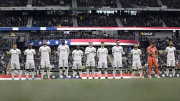 PORTLAND, OREGON - FEBRUARY 22: The Portland Timbers stand during the singing of the National Anthem before a game against the New England Revolution at Providence Park at Providence Park on February 22, 2020 in Portland, Oregon. (Photo by Soobum Im/Getty Images)