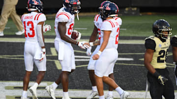 Oct 31, 2020; Nashville, Tennessee, USA; Mississippi Rebels tight end Kenny Yeboah (84) celebrates with quarterback Matt Corral (2) after scoring a touchdown against the Vanderbilt Commodores during the second half at Vanderbilt Stadium. Mandatory Credit: Christopher Hanewinckel-USA TODAY Sports