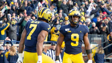 ANN ARBOR, MI - NOVEMBER 16: Donovan Peoples-Jones #9 of the Michigan Wolverines scores a third quarter touchdown and celebrates with teammate Tarik Black #7 at Michigan Stadium on November 16, 2019 in Ann Arbor, Michigan. Michigan defeated Michigan State 44-10. (Photo by Leon Halip/Getty Images)