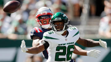 EAST RUTHERFORD, NEW JERSEY - SEPTEMBER 19: (NEW YORK DAILIES OUT) Brandin Echols #26 of the New York Jets defends against Kendrick Bourne #84 of the New England Patriots at MetLife Stadium on September 19, 2021 in East Rutherford, New Jersey. The Patriots defeated the Jets 25-6. (Photo by Jim McIsaac/Getty Images)
