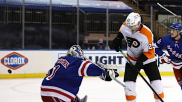 Apr 22, 2021; New York, New York, USA; James van Riemsdyk #25 of the Philadelphia Flyers scores a goal in the third period as Igor Shesterkin #31 of the New York Rangers defends at Madison Square Garden. Mandatory Credit: Elsa/POOL PHOTOS-USA TODAY Sports