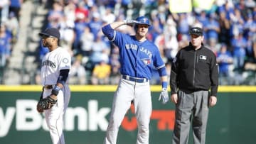 Sep 21, 2016; Seattle, WA, USA; Toronto Blue Jays left fielder Michael Saunders (21) reacts toward the dugout after hitting a double against the Seattle Mariners during the tenth inning at Safeco Field. Mandatory Credit: Joe Nicholson-USA TODAY Sports