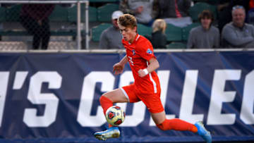 Dec 12, 2021; Cary, NC, USA; Clemson midfielder Brandon Parrish (20) with the ball in the second half at WakeMed Soccer Park. Clemson defeated Washington 2-0. Mandatory Credit: Bob Donnan-USA TODAY Sports
