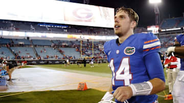 Oct 29, 2016; Jacksonville, FL, USA; Florida Gators quarterback Luke Del Rio (14) runs off the field after they beat the Georgia Bulldogs at EverBank Field. Florida Gators defeated the Georgia Bulldogs 24-10. Mandatory Credit: Kim Klement-USA TODAY Sports
