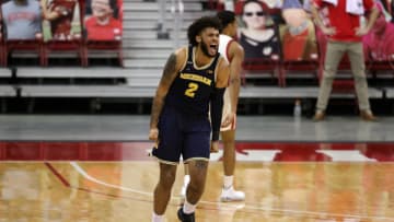MADISON, WISCONSIN - FEBRUARY 14: Isaiah Livers #2 of the Michigan Wolverines reacts to a three point shot during the second half against the Wisconsin Badgers at Kohl Center on February 14, 2021 in Madison, Wisconsin. (Photo by Stacy Revere/Getty Images)