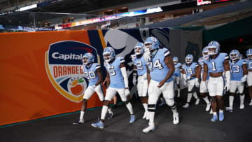 MIAMI GARDENS, FLORIDA - JANUARY 02: North Carolina Tar Heels wait to take the field prior to the game against the Texas A&M Aggies at the Capital One Orange Bowl at Hard Rock Stadium on January 02, 2021 in Miami Gardens, Florida. (Photo by Mark Brown/Getty Images)