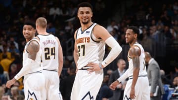 DENVER, CO - MARCH 12: Jamal Murray #27 of the Denver Nuggets reacts to a play during the game against the Minnesota Timberwolves on March 12, 2019 at the Pepsi Center in Denver, Colorado. NOTE TO USER: User expressly acknowledges and agrees that, by downloading and/or using this photograph, user is consenting to the terms and conditions of the Getty Images License Agreement. Mandatory Copyright Notice: Copyright 2019 NBAE (Photo by Bart Young/NBAE via Getty Images)