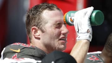 Oct 12, 2014; Tampa, FL, USA; Tampa Bay Buccaneers middle linebacker Dane Fletcher (50) quirts his face with water during the first half against the Baltimore Ravens at Raymond James Stadium. Mandatory Credit: Kim Klement-USA TODAY Sports