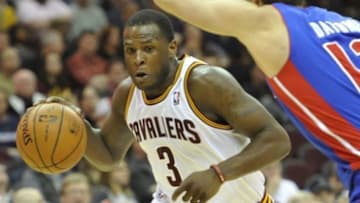 Apr 9, 2014; Cleveland, OH, USA; Cleveland Cavaliers guard Dion Waiters (3) drives against Detroit Pistons forward Luigi Datome (13) in the fourth quarter at Quicken Loans Arena. Mandatory Credit: David Richard-USA TODAY Sports