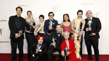 LOS ANGELES, CALIFORNIA - FEBRUARY 26: (L-R) Harry Shum Jr., Jenny Slate, Andy Le, Tallie Medel, Ke Huy Quan, James Hong, Stephanie Hsu, Jamie Lee Curtis, Michelle Yeoh and Brian Le, recipients of the Outstanding Performance by a Cast in a Motion Picture award for "Everything Everywhere All at Once ," pose in the press room during the 29th Annual Screen Actors Guild Awards at Fairmont Century Plaza on February 26, 2023 in Los Angeles, California. (Photo by Frazer Harrison/Getty Images)