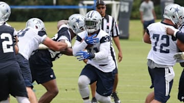 Jun 14, 2016; Irving, TX, USA; Dallas Cowboys running back Ezekiel Elliott (21) runs with the ball during minicamp at Dallas Cowboys Headquarters. Mandatory Credit: Matthew Emmons-USA TODAY Sports