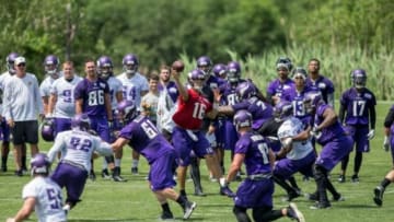 Jun 17, 2014; Eden Prairie, MN, USA; Minnesota Vikings quarterback Matt Cassel (16) throws at practice at Winter Park. Mandatory Credit: Bruce Kluckhohn-USA TODAY Sports