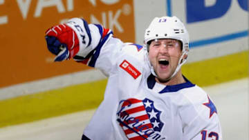 Rochester's Linus Weissbach celebrates his first period goal against Toronto in the season opener.