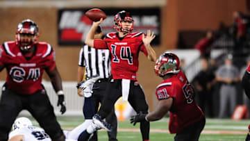 Sep 1, 2016; Bowling Green, KY, USA; Western Kentucky Hilltoppers quarterback Mike White (14) looks to throw the ball during the second half against Rice Owls at Houchens Industries-L.T. Smith Stadium. Western Kentucky Hilltoppers won 46-14. Mandatory Credit: Joshua Lindsey-USA TODAY Sports