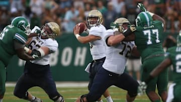 Sep 17, 2016; New Orleans, LA, USA; Navy Midshipmen quarterback Will Worth (15) looks to pass the ball against the Tulane Green Wave in the first quarter at Yulman Stadium. Mandatory Credit: Crystal LoGiudice-USA TODAY Sports