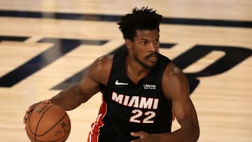 LAKE BUENA VISTA, FLORIDA - SEPTEMBER 04: Jimmy Butler #22 of the Miami Heat dribbles the ball during the first quarter against the Milwaukee Bucks in Game Three of the Eastern Conference Second Round during the 2020 NBA Playoffs at the Field House at the ESPN Wide World Of Sports Complex on September 04, 2020 in Lake Buena Vista, Florida. NOTE TO USER: User expressly acknowledges and agrees that, by downloading and or using this photograph, User is consenting to the terms and conditions of the Getty Images License Agreement. (Photo by Mike Ehrmann/Getty Images)