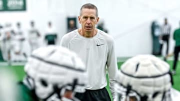 Michigan State's offensive coordinator Jay Johnson works with player during practice on Tuesday, March 29, 2022, at the indoor football facility in East Lansing.220329 Msu Fb Practice 043a