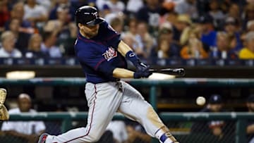 Sep 13, 2016; Detroit, MI, USA; Minnesota Twins second baseman Brian Dozier (2) hits a single in the eighth inning against the Detroit Tigers at Comerica Park. Mandatory Credit: Rick Osentoski-USA TODAY Sports
