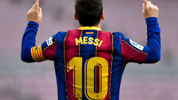 TOPSHOT - Barcelona's Argentine forward Lionel Messi celebrates after scoring a goal during the Spanish League football match between FC Barcelona and RC Celta de Vigo at the Camp Nou stadium in Barcelona on May 16, 2021. (Photo by Pau BARRENA / AFP) (Photo by PAU BARRENA/AFP via Getty Images)