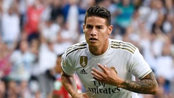 Real Madrid's Colombian midfielder James Rodriguez celebrates scoring his team's fourth goal during the Spanish league football match between Real Madrid CF and Granada FC at the Santiago Bernabeu stadium in Madrid on October 5, 2019. (Photo by PIERRE-PHILIPPE MARCOU / AFP) (Photo by PIERRE-PHILIPPE MARCOU/AFP via Getty Images)