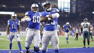 Oct 9, 2016; Detroit, MI, USA; Detroit Lions running back Theo Riddick (25) celebrates with teammates center Graham Glasgow (60) and wide receiver Marvin Jones (11) after a touchdown run during the first quarter against the Philadelphia Eagles at Ford Field. Mandatory Credit: Raj Mehta-USA TODAY Sports