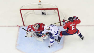 WASHINGTON, DC - MAY 15: Braden Holtby #70 of the Washington Capitals follows the puck in front of Tyler Johnson #9 of the Tampa Bay Lightning in the first period in Game Three of the Eastern Conference Final during the 2018 NHL Stanley Cup Playoffs at Capital One Arena on May 15, 2018 in Washington, DC. (Photo by Patrick McDermott/NHLI via Getty Images)