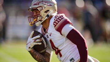 Florida State Seminoles wide receiver Mycah Pittman (4) makes his way down the field. The Florida State Seminoles hosted their annual Garnet and Gold spring game at Doak Campbell Stadium on Saturday, April 9, 2022.Fsu Spring Game693