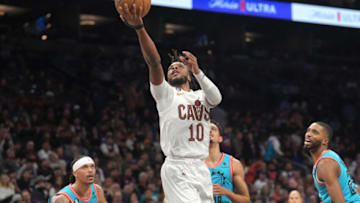 Jan 8, 2023; Phoenix, Arizona, USA; Cleveland Cavaliers guard Darius Garland (10) puts up a layup against the Phoenix Suns during the second half at Footprint Center. Mandatory Credit: Joe Camporeale-USA TODAY Sports