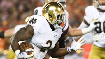 BLACKSBURG, VA - OCTOBER 6: Running back Dexter Williams #2 of the Notre Dame Fighting Irish rushes against the Virginia Tech Hokies in the first half at Lane Stadium on October 6, 2018 in Blacksburg, Virginia. (Photo by Michael Shroyer/Getty Images)