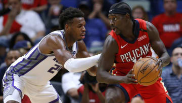 Jrue Holiday #11 of the New Orleans Pelicans drives against Buddy Hield chman/Getty Images)