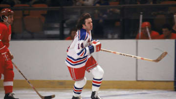 Canadian hockey player Don Murdoch forward of the New York Rangers in action on the ice during a home game against the Detroit Red Wings at Madison Suqare Garden, New York, 1979. (Photo by Bruce Bennett/Getty Images)