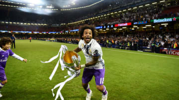 CARDIFF, WALES - JUNE 03: Marcelo of Real Madrid celebrates with The Champions League trophy after the UEFA Champions League Final between Juventus and Real Madrid at National Stadium of Wales on June 3, 2017 in Cardiff, Wales. (Photo by Laurence Griffiths/Getty Images)