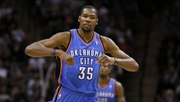 Jan 22, 2014; San Antonio, TX, USA; Oklahoma City Thunder forward Kevin Durant (35) reacts after a shot during the second half against the San Antonio Spurs at AT