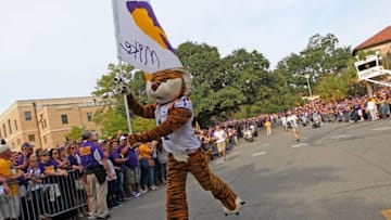 Oct 17, 2015; Baton Rouge, LA, USA; LSU Tigers mascot Mike the Tiger runs past fans prior to kickoff against the Florida Gators at Tiger Stadium. Mandatory Credit: Crystal LoGiudice-USA TODAY Sports