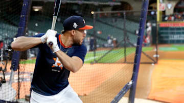 HOUSTON, TX - OCTOBER 30: George Springer #4 of the Houston Astros takes batting practice prior to Game 7 of the 2019 World Series between the Washington Nationals and the Houston Astros at Minute Maid Park on Wednesday, October 30, 2019 in Houston, Texas. (Photo by Rob Tringali/MLB Photos via Getty Images)