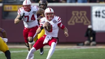 Oct 26, 2013; Minneapolis, MN, USA; Nebraska Cornhuskers quarterback Taylor Martinez (3) scrambles out of the pocket in the second quarter against the Minnesota Golden Gophers at TCF Bank Stadium. Mandatory Credit: Jesse Johnson-USA TODAY Sports
