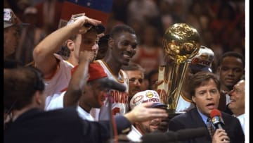 14 Jun 1995: Center Hakeen Olajuwon of the Houston Rockets celebrates after a Finals game against the Orlando Magic at The Summit in Houston, Texas. The Rockets won the game, 113-101. Mandatory Credit: Allsport /Allsport Mandatory Credit: Allsport /Al