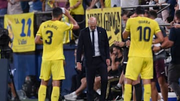 Real Madrid's French coach Zinedine Zidane (C) reacts during the Spanish league football match Villarreal CF against Real Madrid CF at La Ceramica stadium in Vila-real on September 1, 2019. (Photo by Josep LAGO / AFP) (Photo credit should read JOSEP LAGO/AFP/Getty Images)
