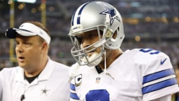 Oct 27, 2014; Arlington, TX, USA; Dallas Cowboys quarterback Tony Romo (9) walks off the field after the game against the Washington Redskins at AT&T Stadium. The Redskins beat the Cowboys 20-17 in overtime. Mandatory Credit: Matthew Emmons-USA TODAY Sports