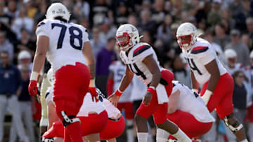 BOULDER, COLORADO - OCTOBER 05: Quarterback Khalil Tate #14 of the Arizona Wildcats calls a play at the line of scrimmage against the Colorado Buffaloes in the second quarter at Folsom Field on October 05, 2019 in Boulder, Colorado. (Photo by Matthew Stockman/Getty Images)
